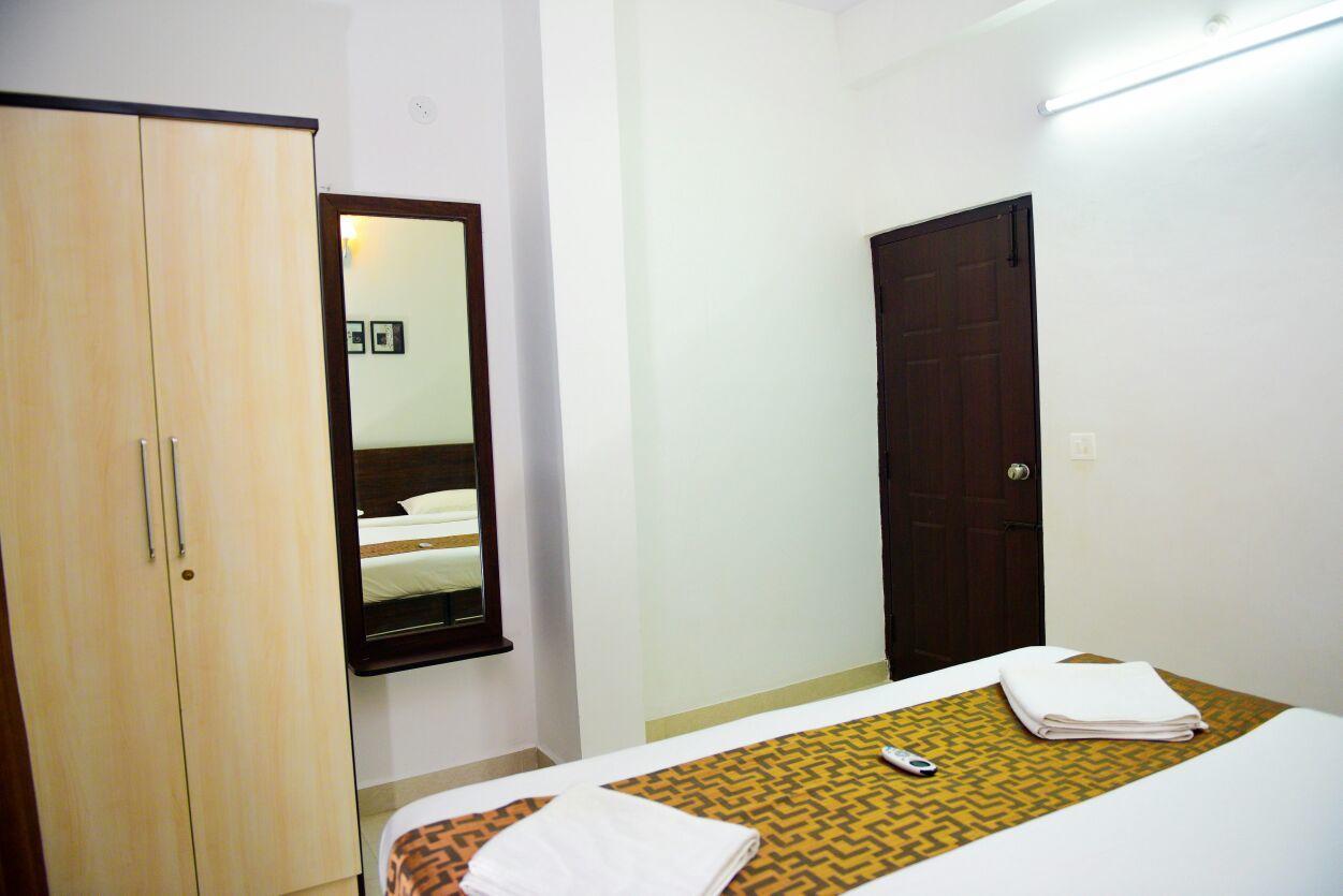 Varsha Enclave- Trinity House Aparthotel Mysore Esterno foto